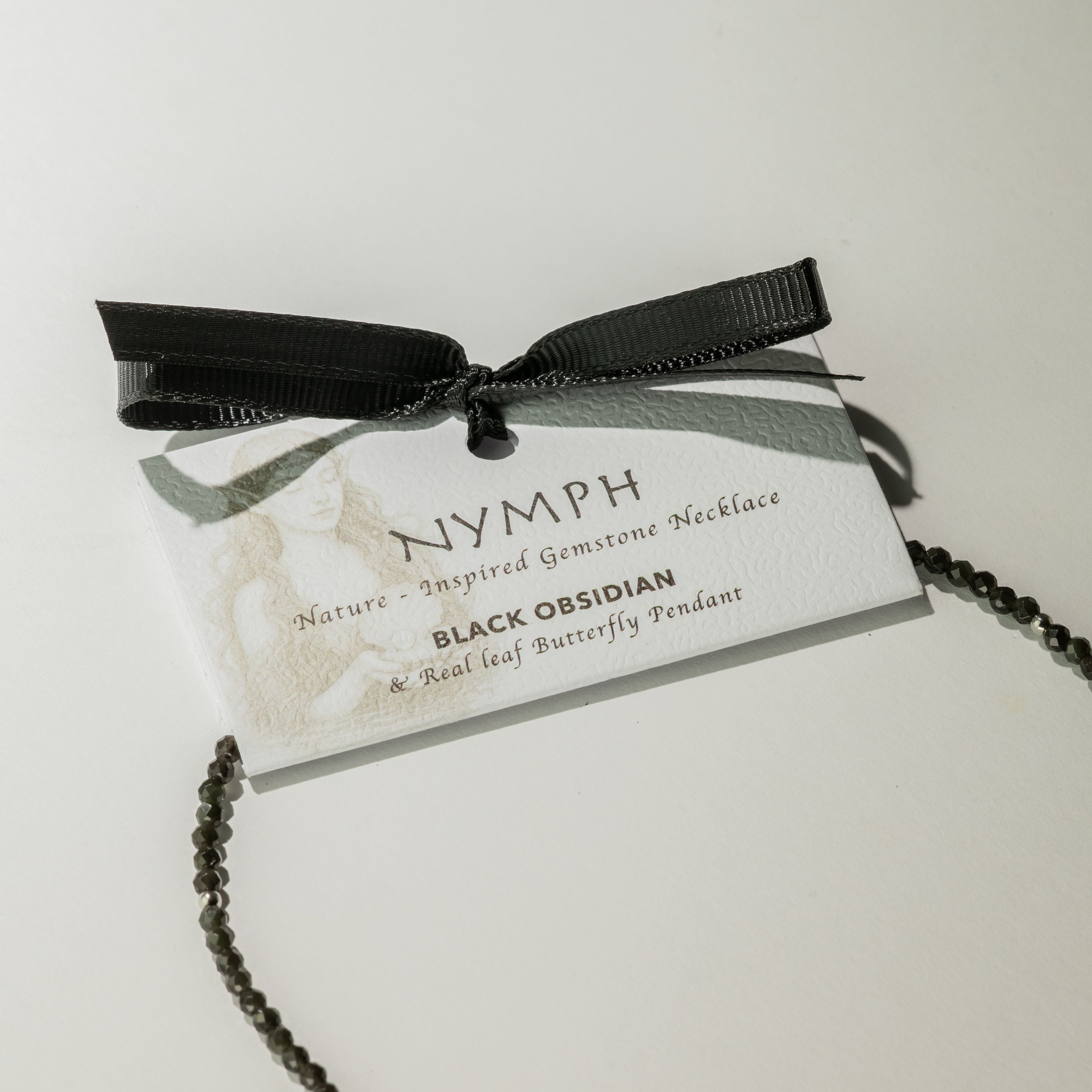 Collar de gema de obsidiana negra ninfa con colgante de mariposa hecho de una hoja real